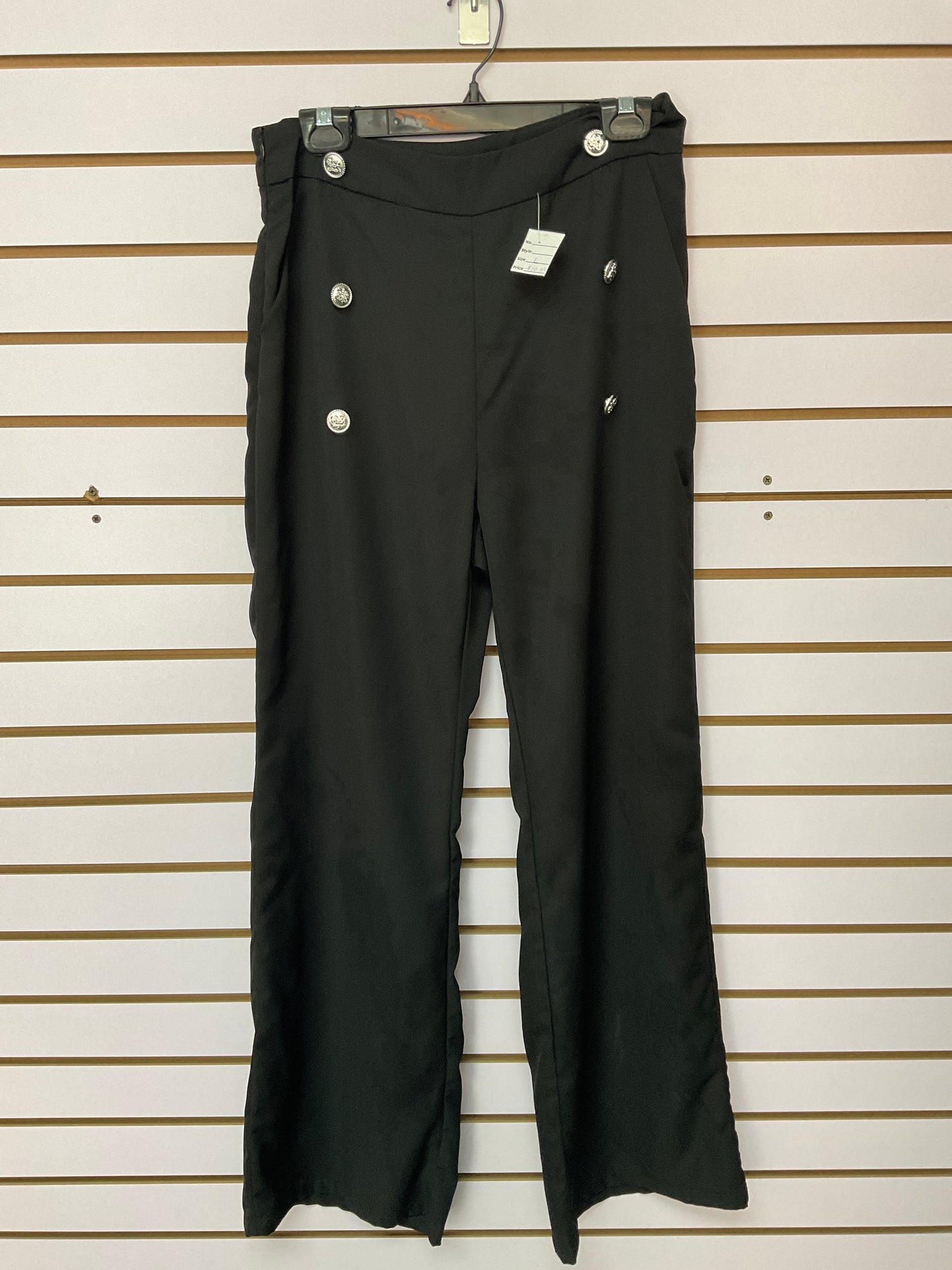 Pantalón negro6 botones plata