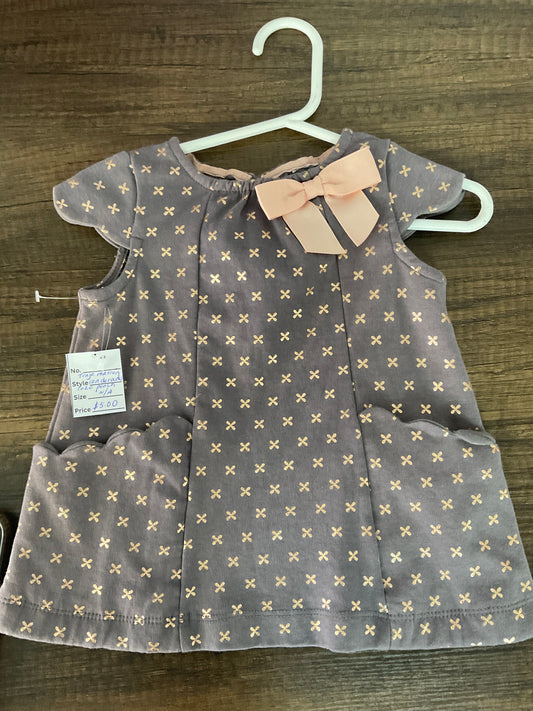 Traje marrón con dorado