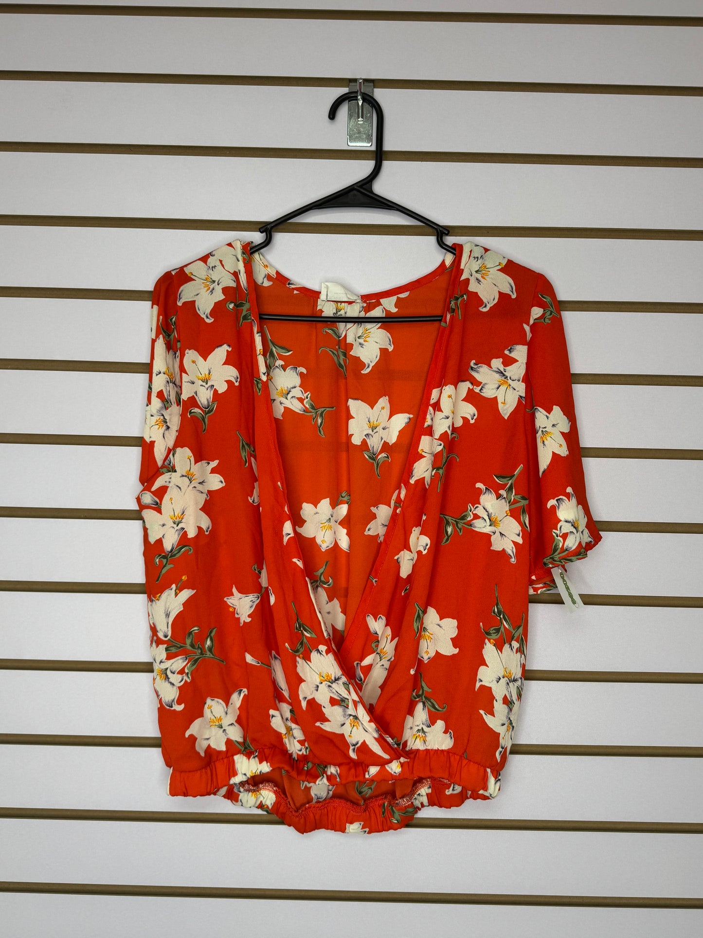 Blusa Naranja con Flores Blancas