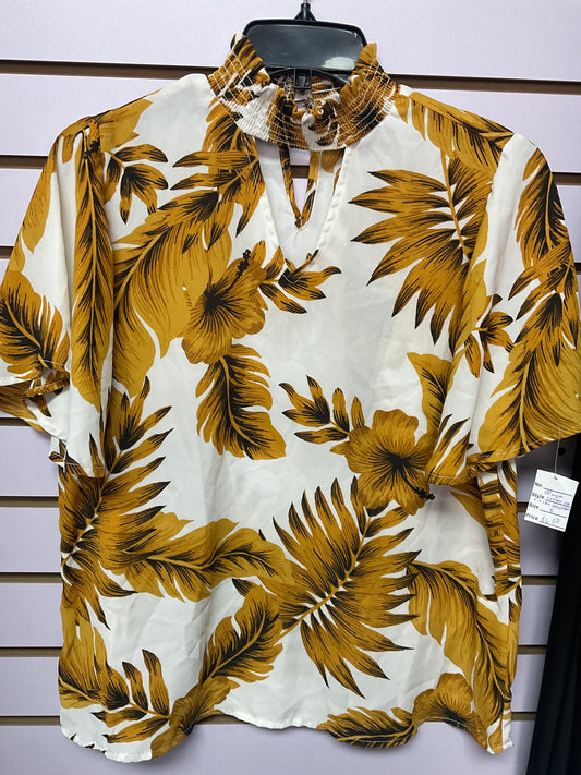 Blusa crema con flores amarillas